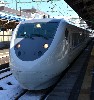 11694